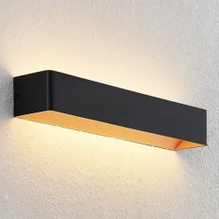 Arcchio LED-væglampe Karam, 53 cm, sort, metal, op/ned