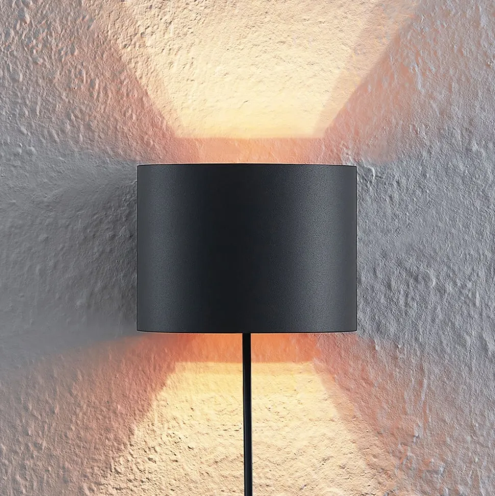 Arcchio væglampe Zuzana, rund, sort, stik, 13 cm