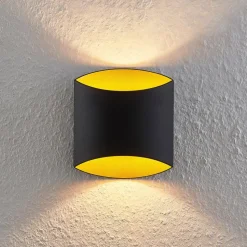 Arcchio Vilja væglampe, sort, guld, oval