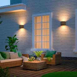 Calex udendørs LED-væglampe oval, op/ned, højde 10 cm, rustbrun