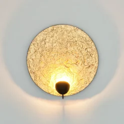 LED-væglampe Traversa, skinnende guld, Ø 35 cm
