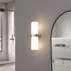 Lucande Basolo væglampe til badeværelset, krom, højde 31,5 cm, glas, IP44