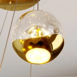 Lucande LED-hængelampe Hayley, Ø 40 cm, 9 lyskilder, guld, glas