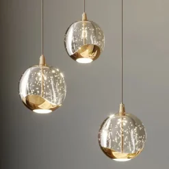 Lucande LED-pendellampe Hayley, Ø 25 cm, 3 lyskilder, guld, glas