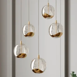 Lucande LED-pendellampe Hayley, Ø 30 cm, 5 lyskilder, guld, glas