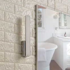 Lucande LED-væglampe til badeværelset Julie, 32 cm høj, krom, IP44