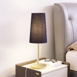 Lucande Pordis-bordlampe, messing-sort