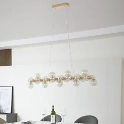 Lucande-pendel Naelen, guld/amber, 125 cm, glas, G9