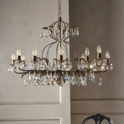 Lysekrone Teresa, 12 lyskilder, bronzefarvet, krystal