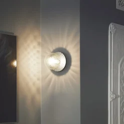 Nuura Liila 1 Medium væglampe IP44, sølv/hvid, varmhvid