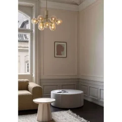 Nuura lysekrone Apiales 9, Ø 60 cm, messing-/guldfarvet