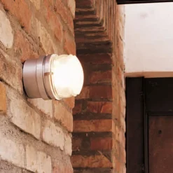 Oluce Fresnel - Væglampe med glaslinse IP44 krom