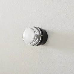 Oluce Fresnel væglampe m. glaslinse IP44 sort