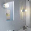 Oluce LED-væglampe Fresnel, grå, aluminium, glas, 2.700 K