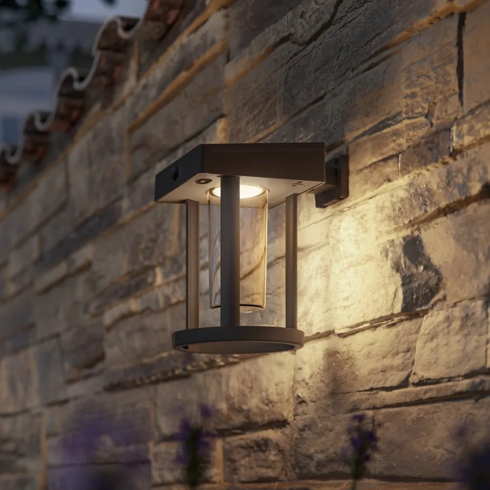 Philips solcelle-væglampe Camill, sort/klar, Ø 14 cm