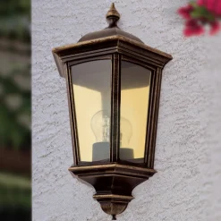 Puchberg udendørs væglampe, direkte, sort-guld