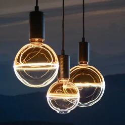 Segula LED-kugle Illusion, E27 G125 blå/gul 5W 1.900K dæmpbar