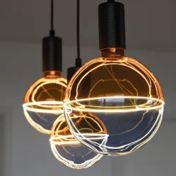 Segula LED-kugle Illusion, E27 G125 blå/gul 5W 1.900K dæmpbar