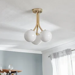 Selva loftlampe med tre glaskugler, guld